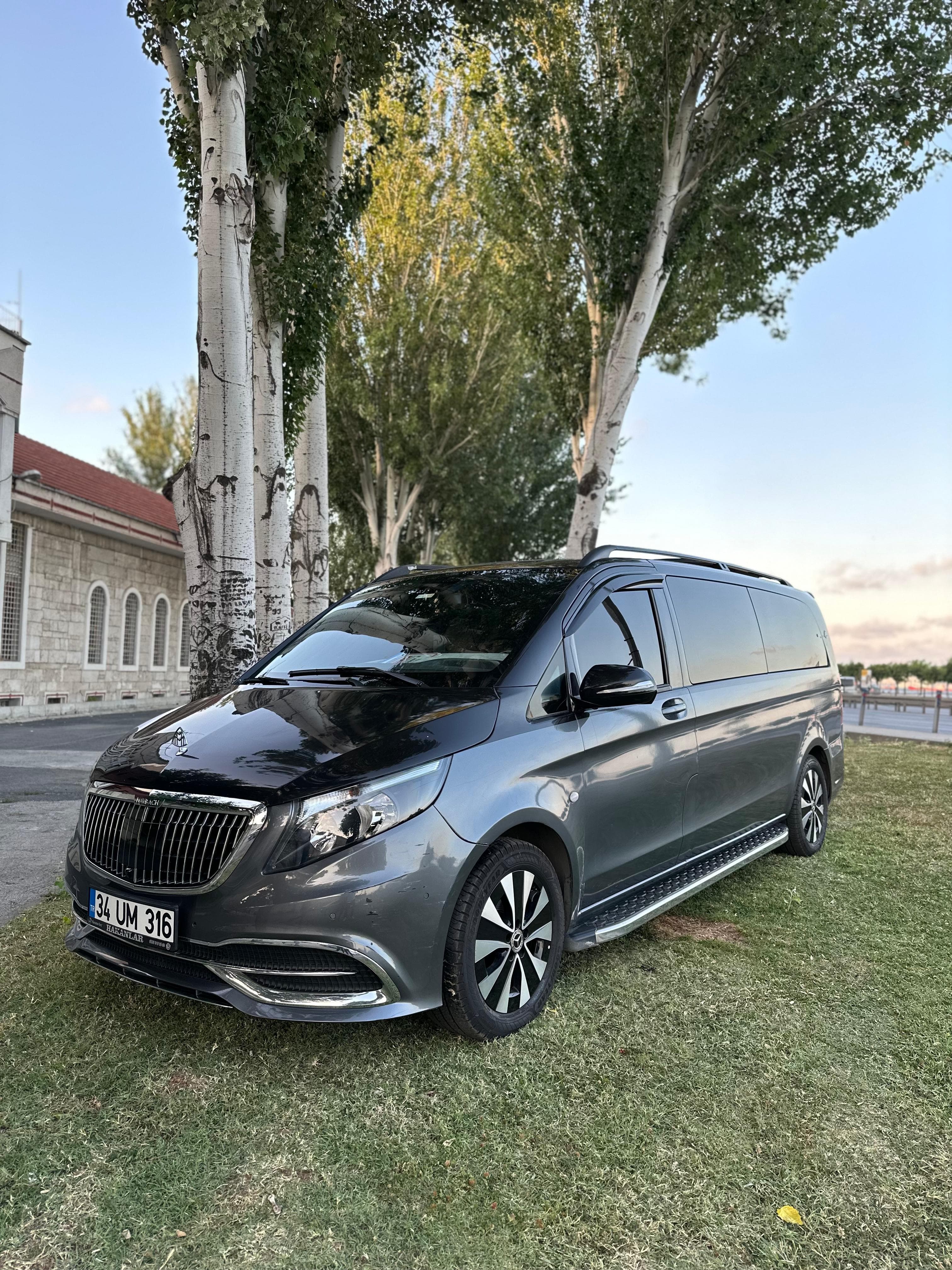 Right front view of black luxury vito van